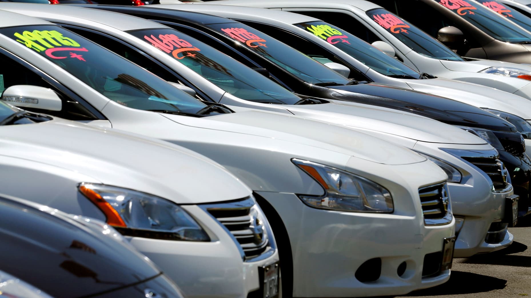 Automobiles are shown for sale at a car dealership in Carlsbad, California.